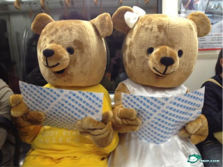 Illustration for article titled There are Giant Teddy Bears Riding the Subway. They Seem Friendly.